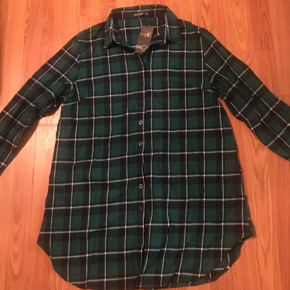 NWT. Brand new. Super cute flannel plaid tunic.
